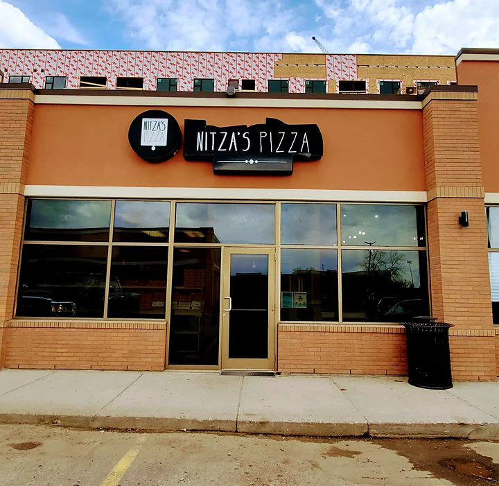 Nitza's Pizza storefront on 50 Street in Leduc